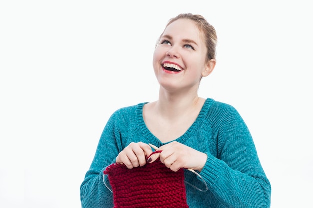 happy person holding embroidered hoop